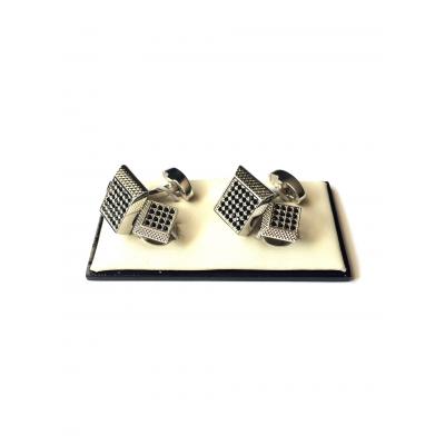 Set of chrome steel cufflinks and shirt button